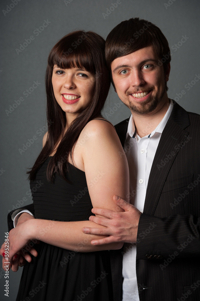 Couple on grey background