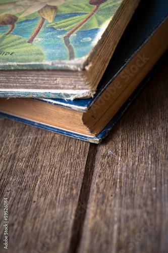 Vintage old books on wooden