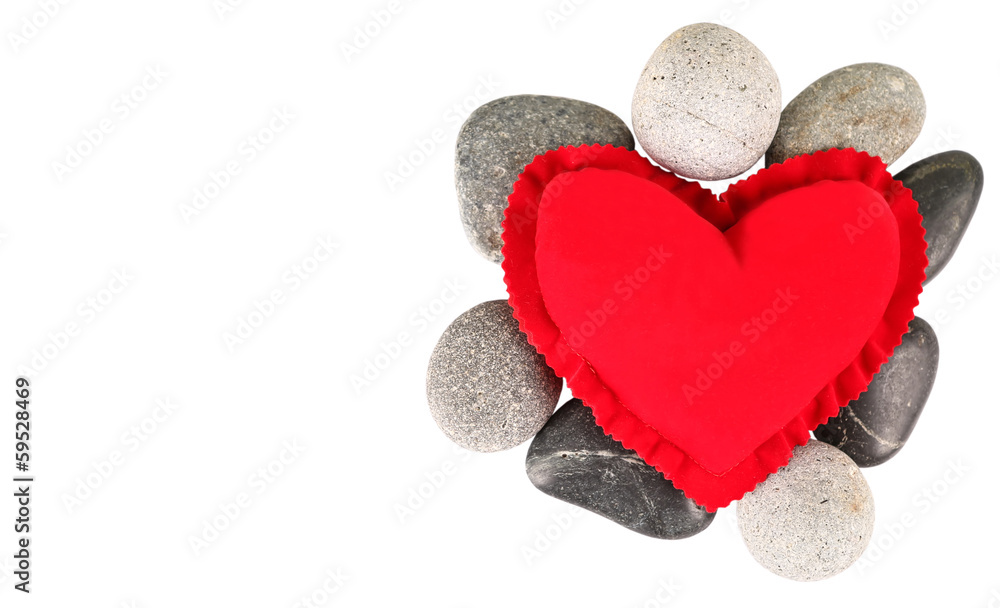 Obraz premium Valentine red heart with zen stones over white background