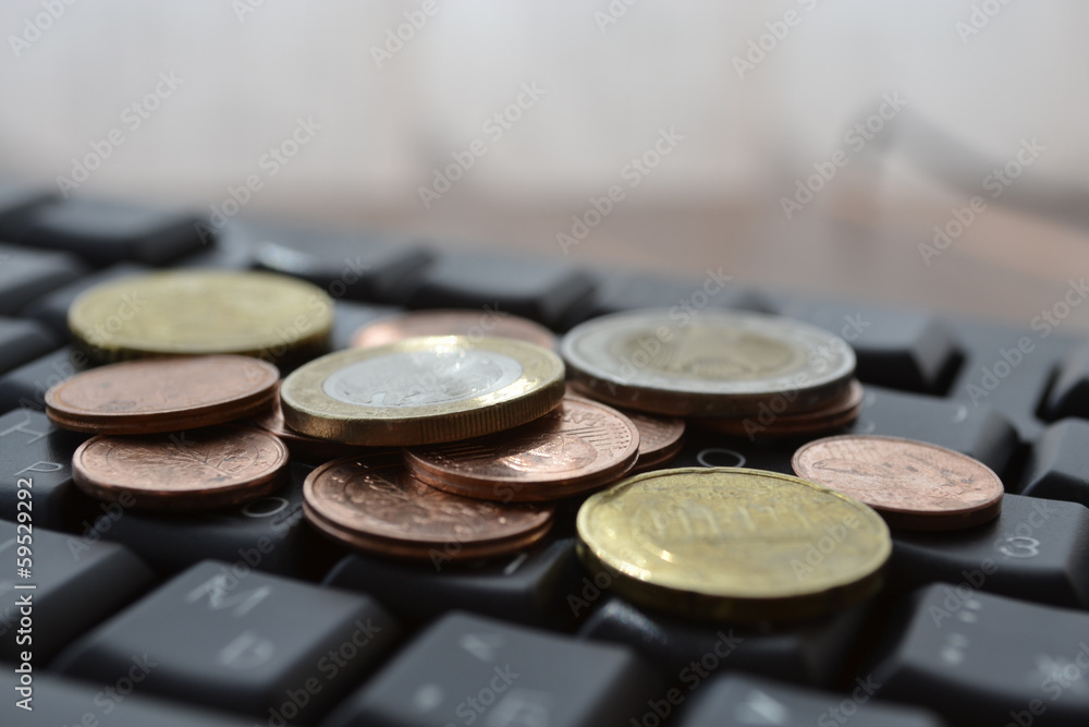 Coins on the keyboard Coins on the keyboard