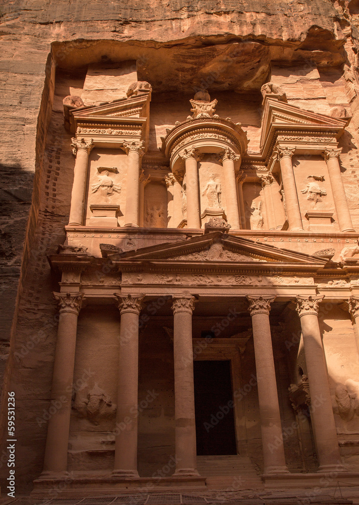 City of Petra and picture of Treasury which is half in shadow ha City of Petra and picture of Treasury which is half in shadow ha