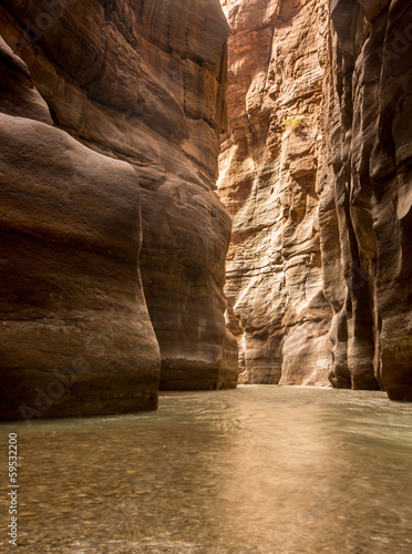 Vertical picture of River Canyon of Wadi Mujib with light on end
