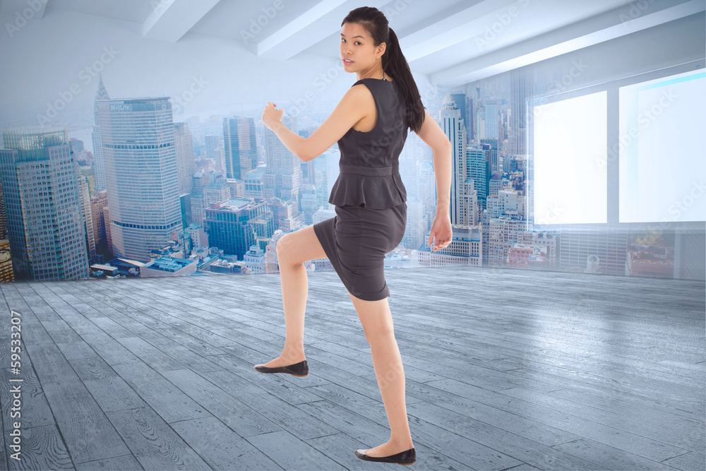 Composite image of businesswoman stepping up Composite image of businesswoman stepping up