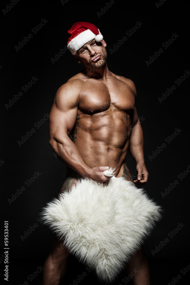 Funny cheerful naked Santa Claus.