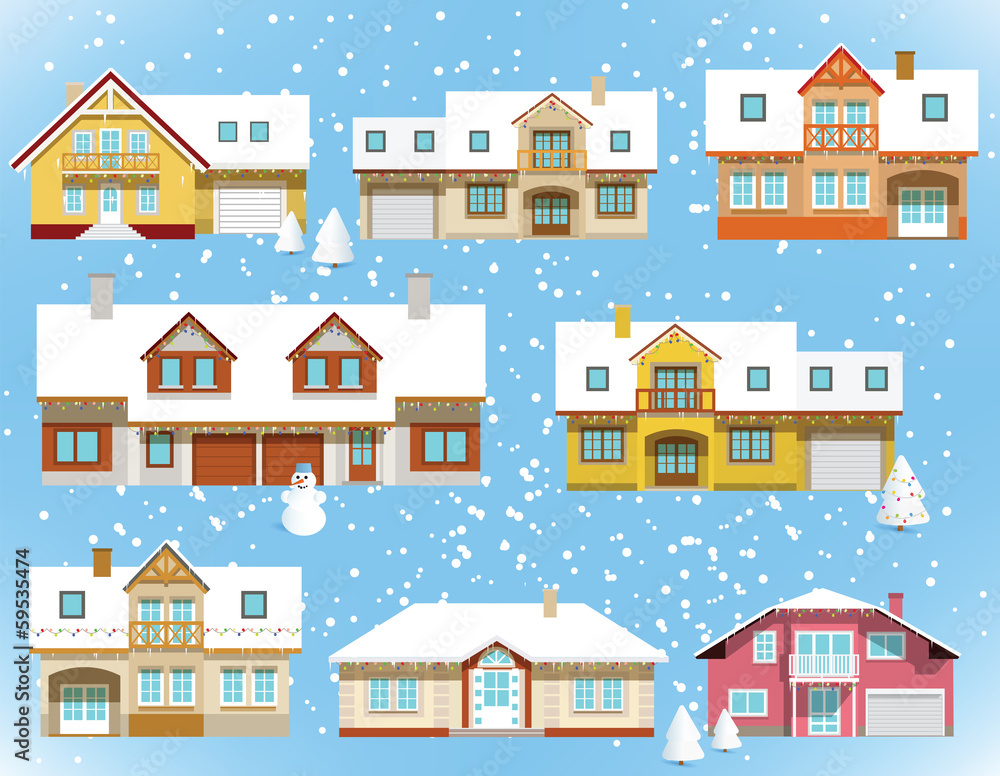 Snow covered city houses