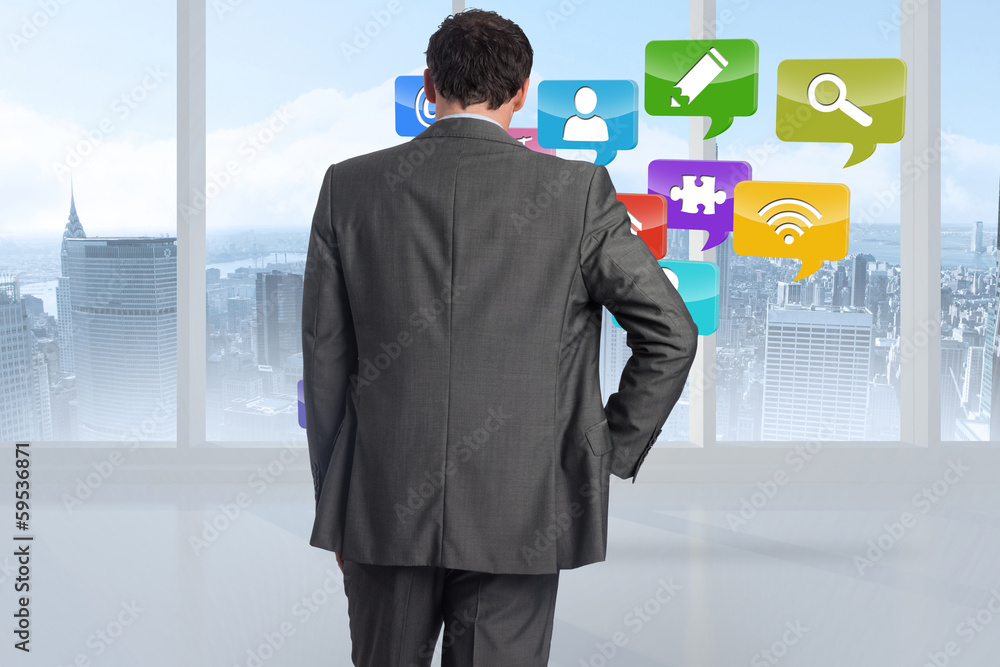 Composite image of businessman with hand on hip Composite image of businessman with hand on hip
