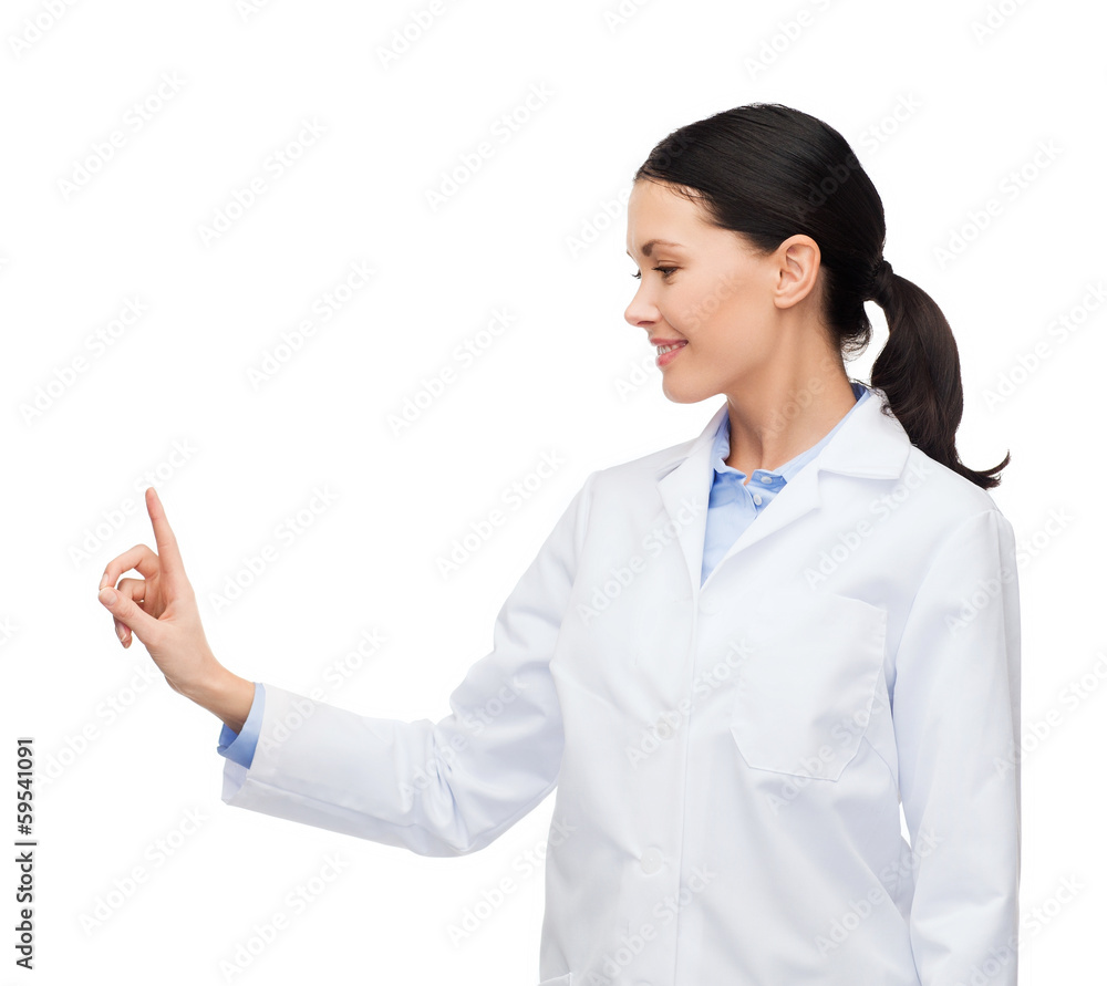 smiling female doctor pointing to something smiling female doctor pointing to something