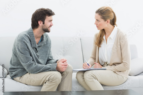 Young man in meeting with a financial adviser