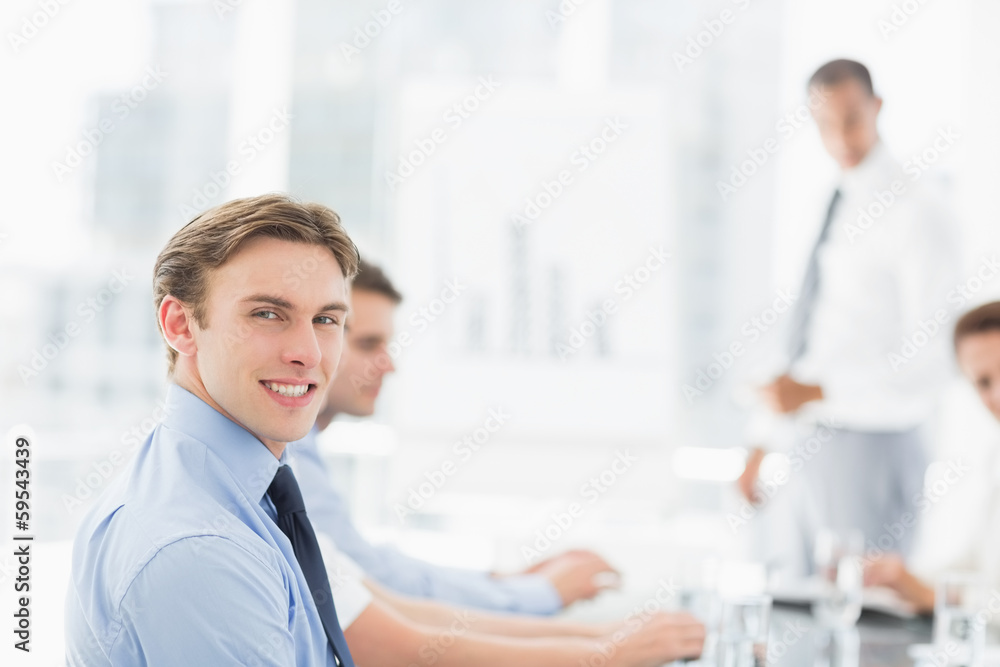 custom made wallpaper toronto digitalSmiling businessman looking at camera during a meeting