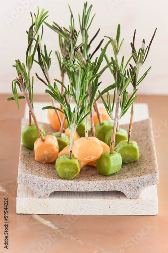 Vegetarian candy with rosemary photo