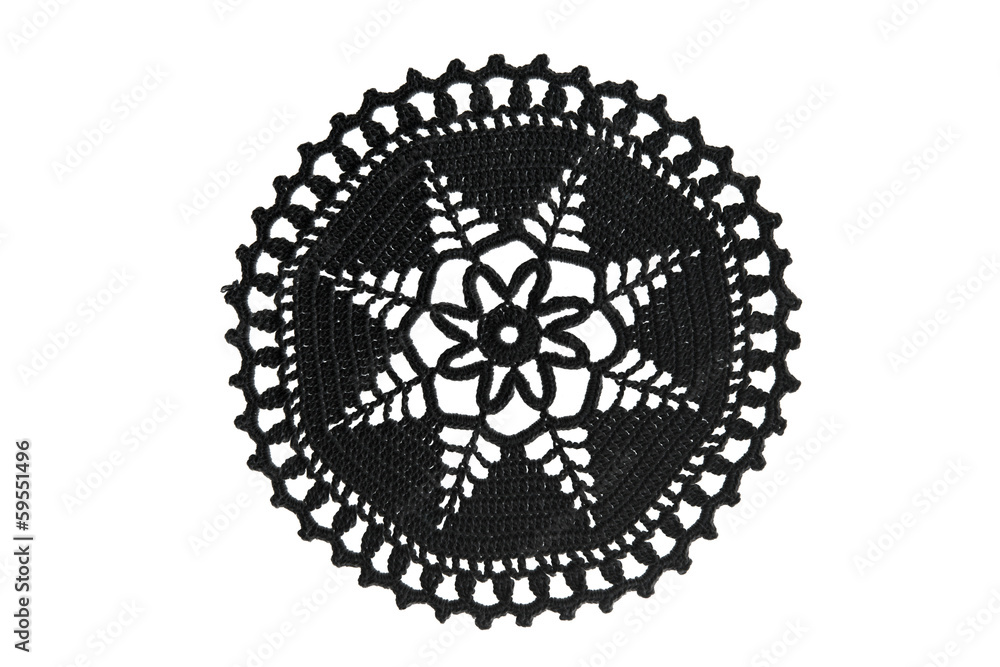 Black lace with pattern of snowflakes on white background