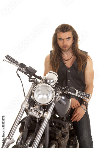 man leather vest motorcycle look serious
