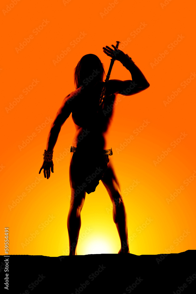 silhouette man loin cloth hand up