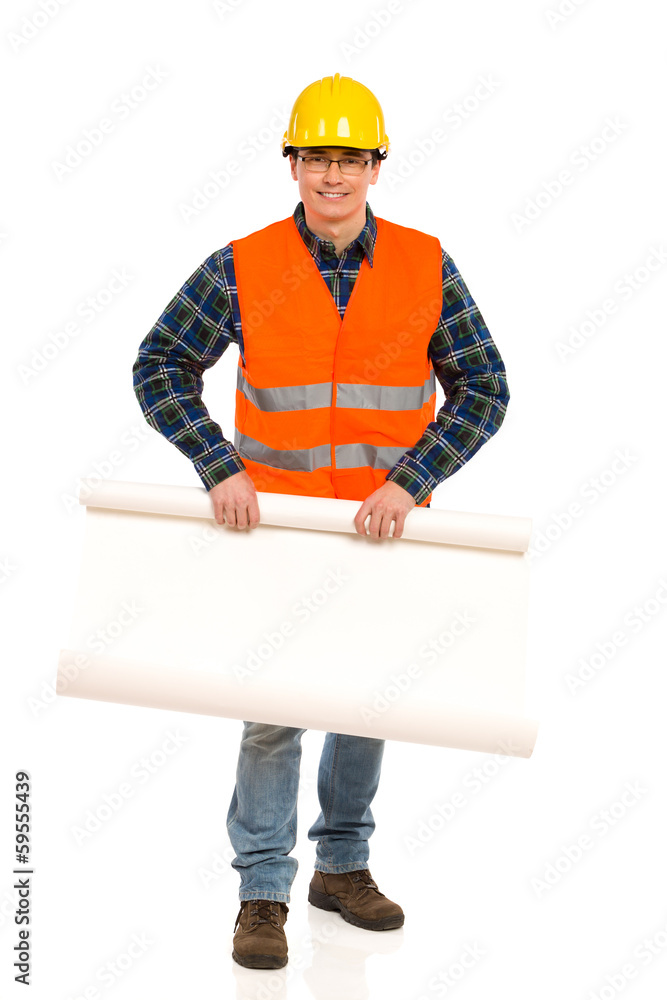 Engineer holds open paper roll. Engineer holds open paper roll.
