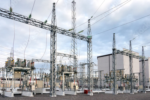 High voltage electric power substation in autumn day