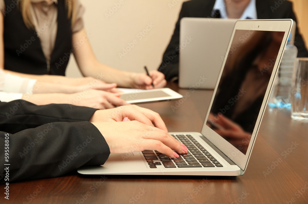 Female hands with digital tablet on office background. Female hands with digital tablet on office background.