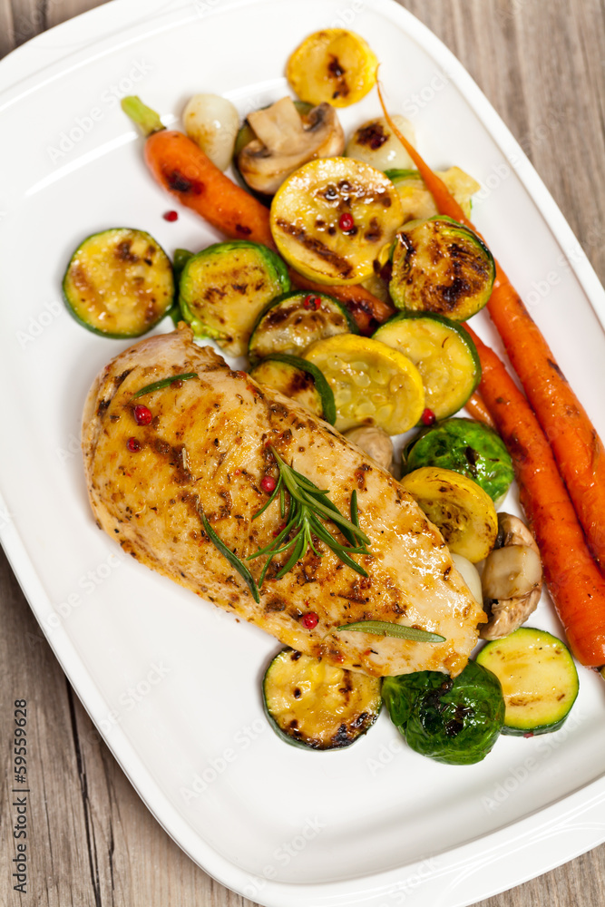 Grilled chicken breasts and vegetables Grilled chicken breasts and vegetables