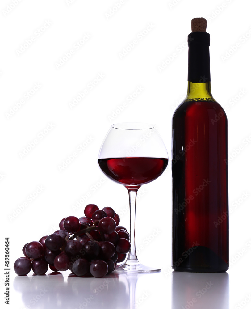 Wineglass with red wine, grape and bottle isolated on white