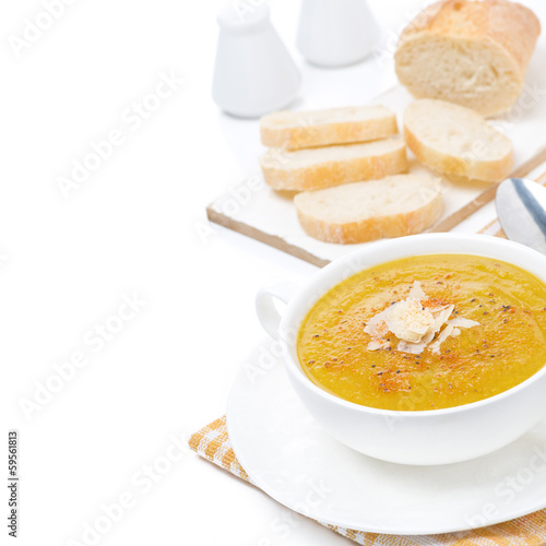 Cream soup of yellow lentils with vegetables, isolated