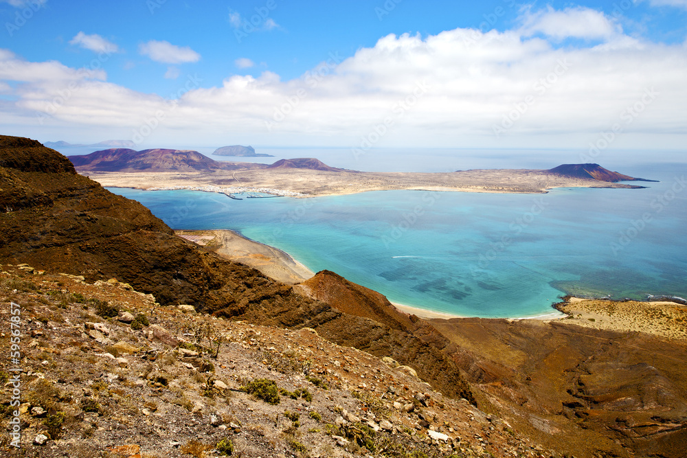 miramar del rio harbor rock   yacht water  in lanzarote spain