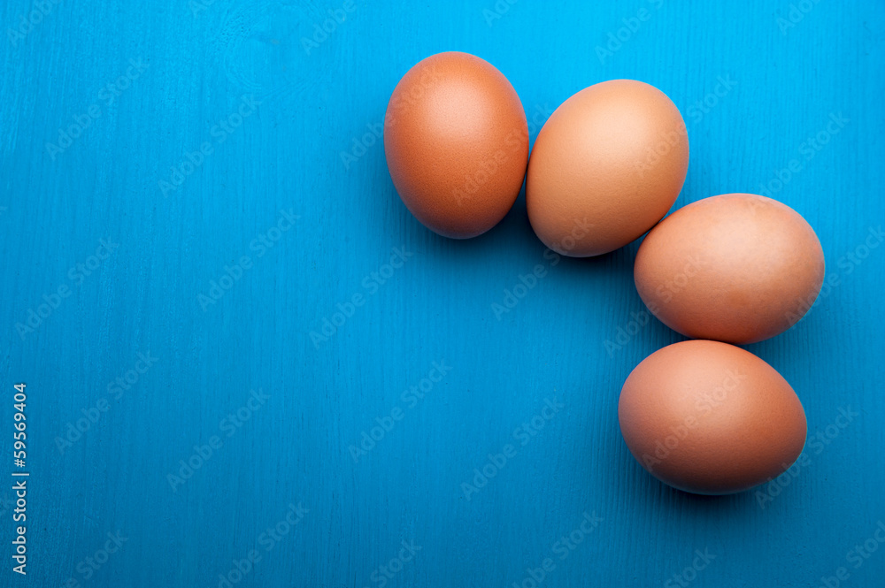 raw eggs on the kitchen table raw eggs on the kitchen table