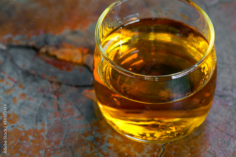 Golden Brown Whisky on the rocks in a glass Golden Brown Whisky on the rocks in a glass