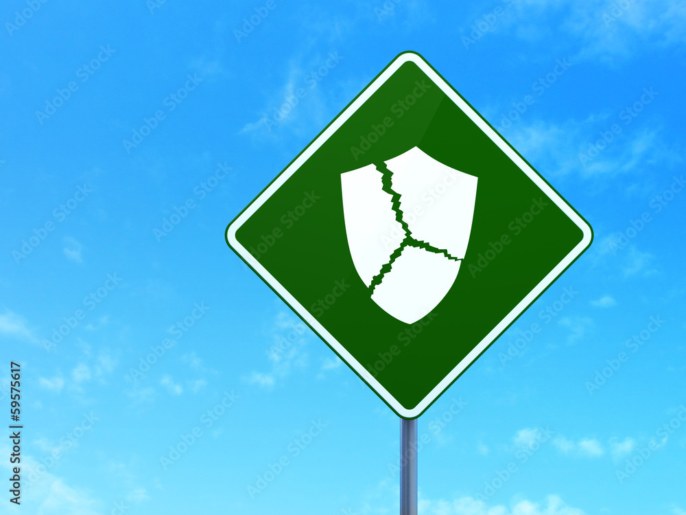 Privacy concept: Broken Shield on road sign background Privacy concept: Broken Shield on road sign background