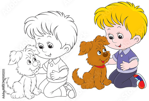 Little boy playing with his puppy
