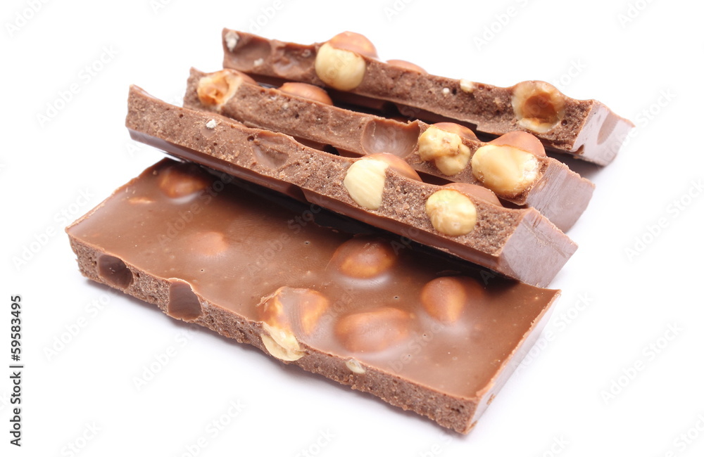 Closeup of chocolate pieces on white background Closeup of chocolate pieces on white background