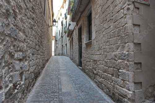 Street in the medieval quarter of Girona  Spain