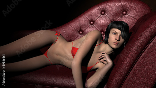 beautiful girl posing in red bikini on a sofa