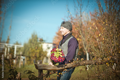 man with flowers photo