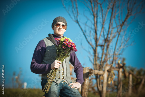 man with flowers photo