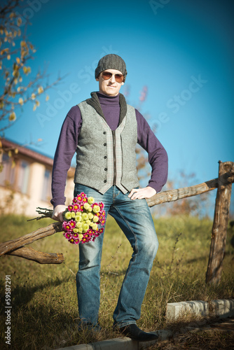 man with flowers photo