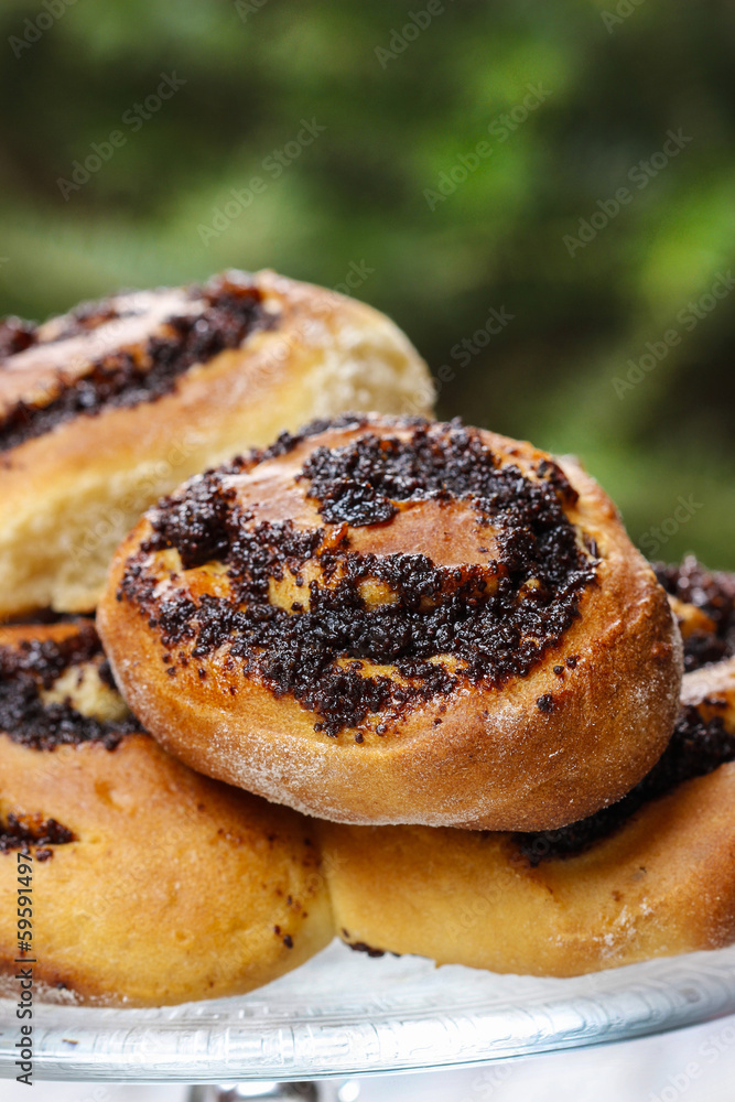 Poppy seed buns on cake stand. Christmas eve setting, tradition Poppy seed buns on cake stand. Christmas eve setting, tradition