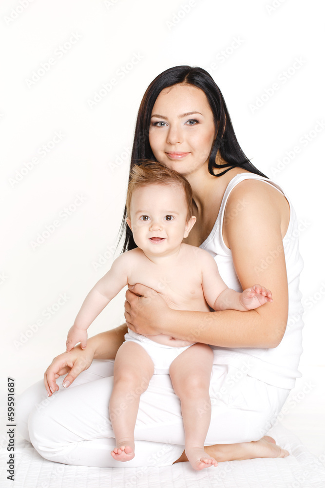 Mother with baby isolated on white. Happy family with newborn. Mother with baby isolated on white. Happy family with newborn.