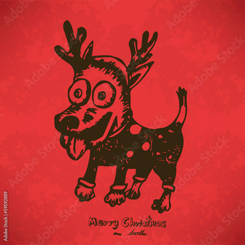 doodle Dog dressed up in reindeer antlers