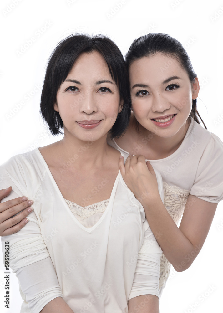 Asian daughter hugging her mother Asian daughter hugging her mother