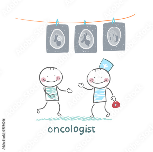 oncologist shows the x-ray images of the patient