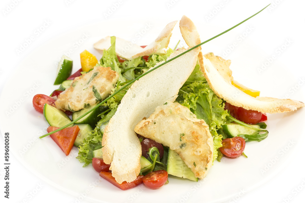 salad of meat cheese and vegetables in a restaurant