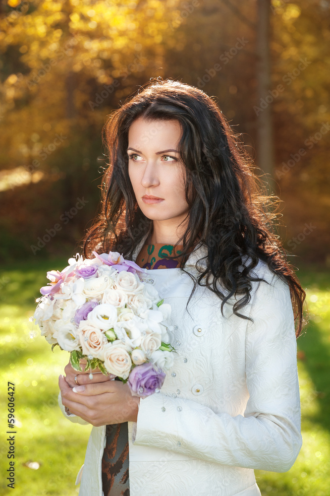 Beautiful young woman with flowers Beautiful young woman with flowers