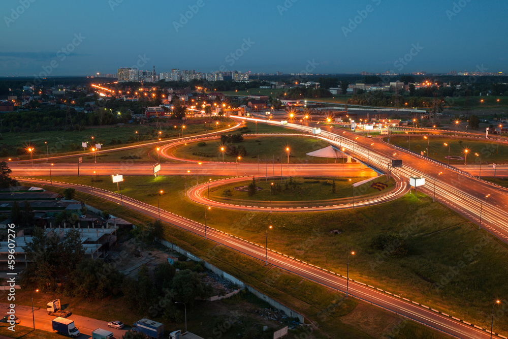 Night urban view with a large transport interchange