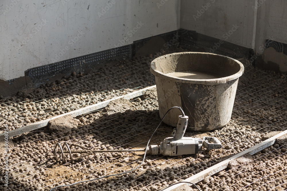 Bucket with blunger on expanded clay aggregate Bucket with blunger on expanded clay aggregate