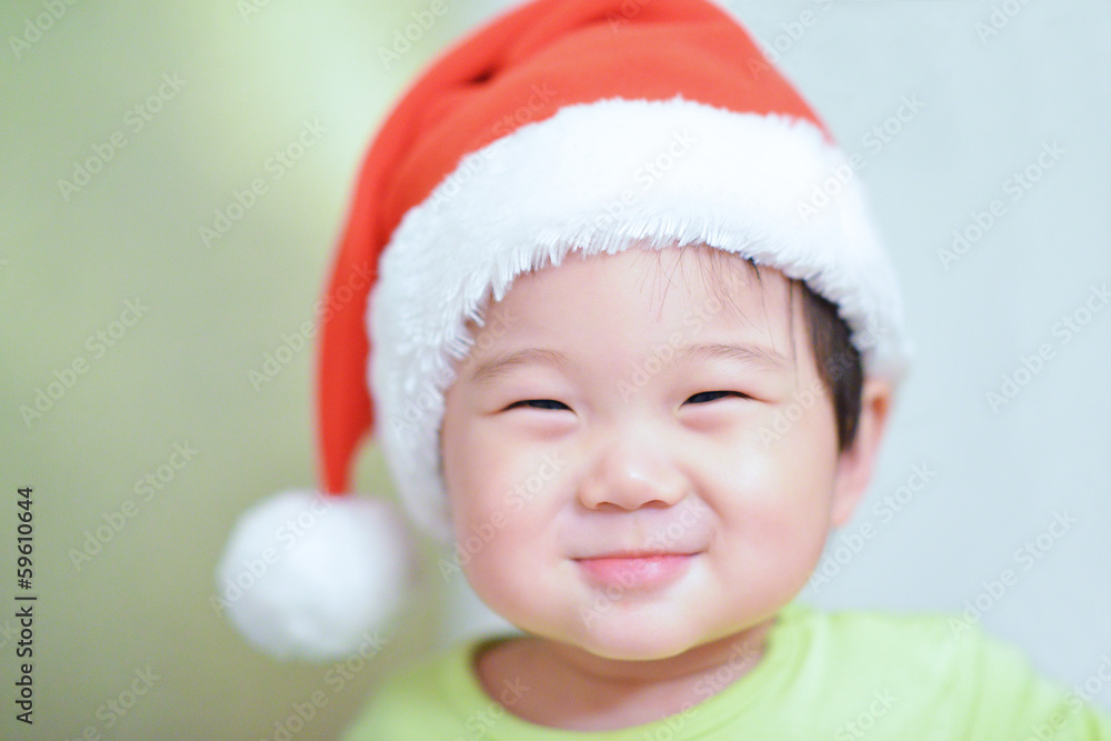 baby boy wearing christmas cap baby boy wearing christmas cap