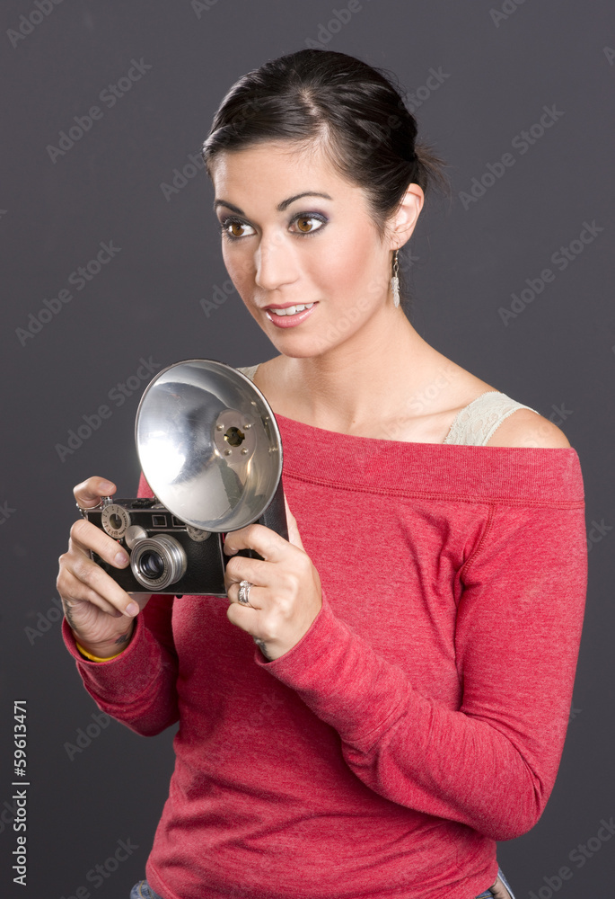Fototapeta premium Vintage Photographer Attractive Woman Holding Camera With Flash