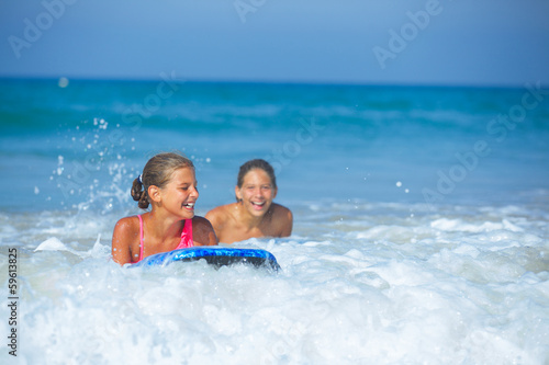 Summer vacation - surfer girls.