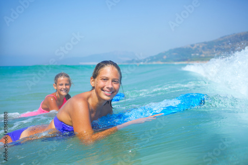 Summer vacation - surfer girls.