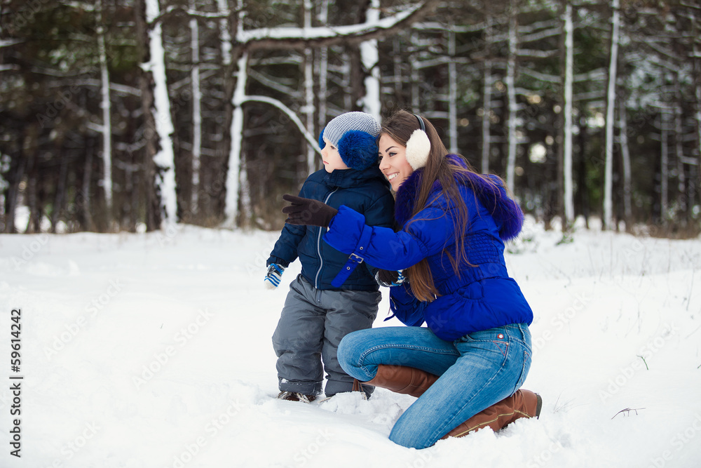 Mother and son enjoying beautiful winter day