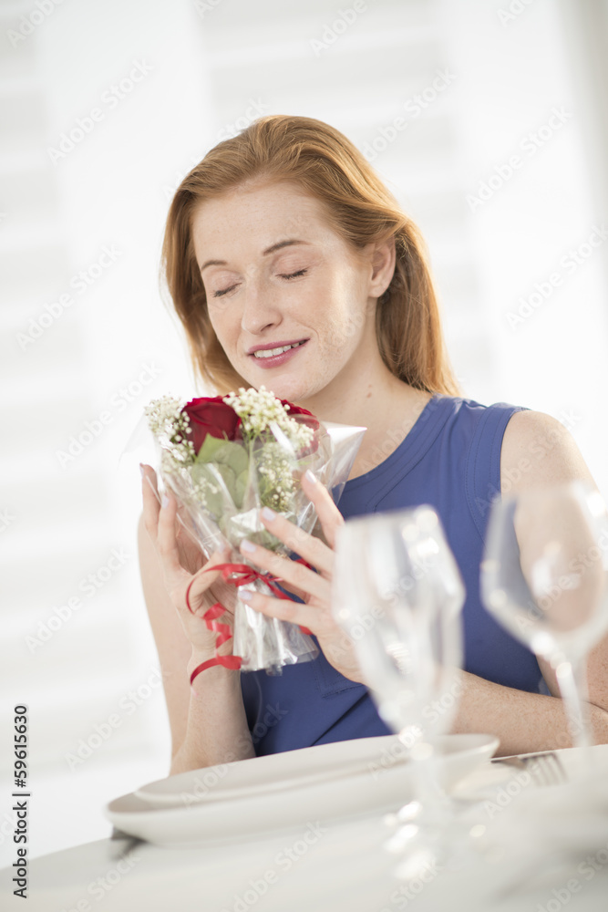 beautiful woman smells flowers bouquet at romantic dating beautiful woman smells flowers bouquet at romantic dating