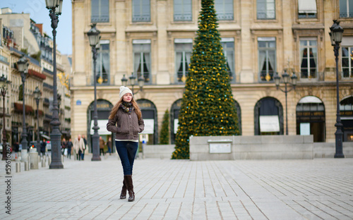 Girl on a Parisian street decorated for Christmas © Ekaterina Pokrovsky